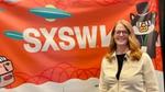 Dr.ssa Samantha Samaras, SVP Science & Technology di Unilever, sorride davanti al banner della conferenza SXSW.